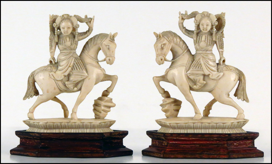 PAIR OF CARVED IVORY FIGURES OF 178097