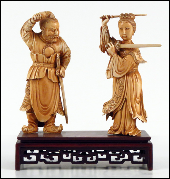 PAIR OF CARVED IVORY FIGURES OF 178098