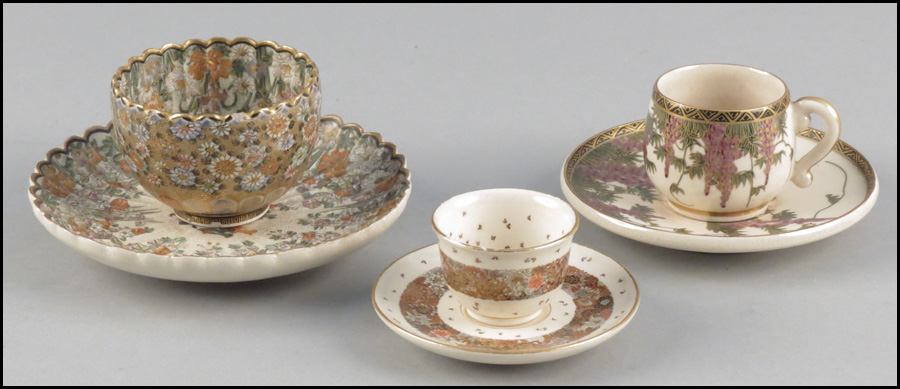 THREE JAPANESE CUPS AND SAUCERS.