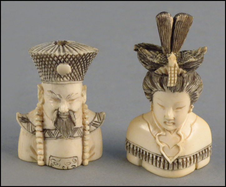 PAIR OF IVORY SNUFF BOTTLES. Condition: