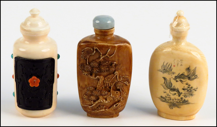 THREE IVORY SNUFF BOTTLES. Condition: