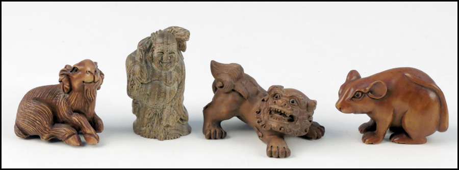 GROUP OF FOUR CARVED WOOD NETSUKE.