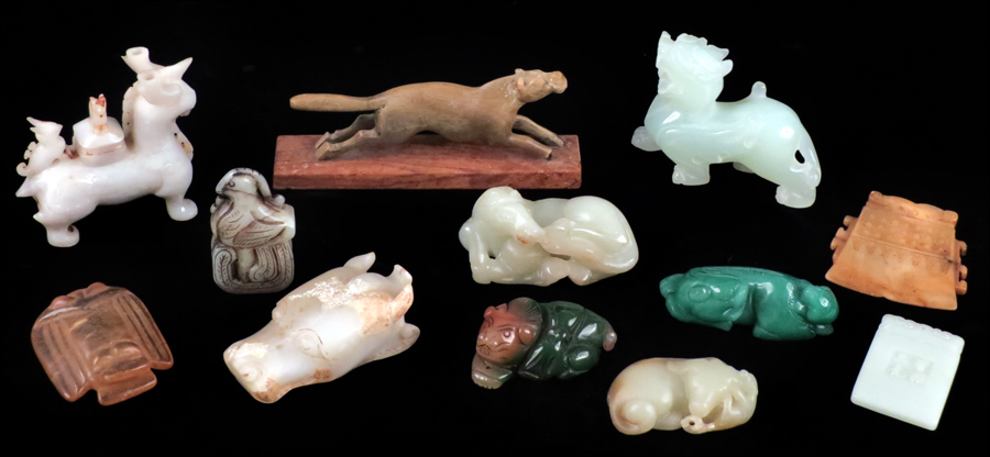 COLLECTION OF CARVED JADE STONE