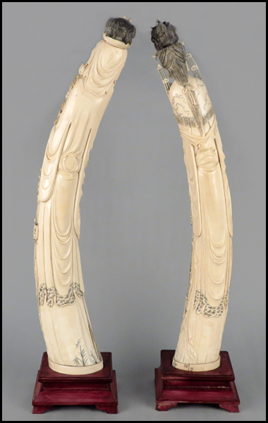 PAIR OF CHINESE CARVED IVORY TUSKS.