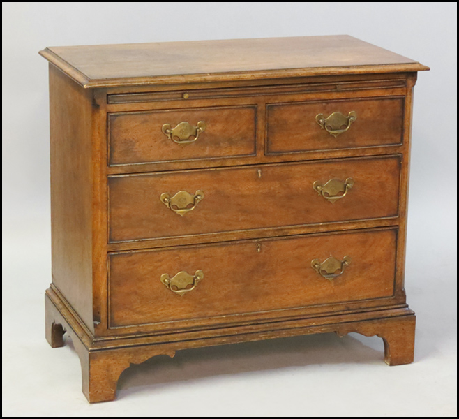 FOUR DRAWER CHEST. With pull out writing