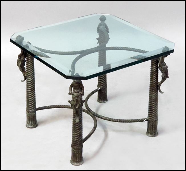 PATINATED METAL COCKTAIL TABLE.