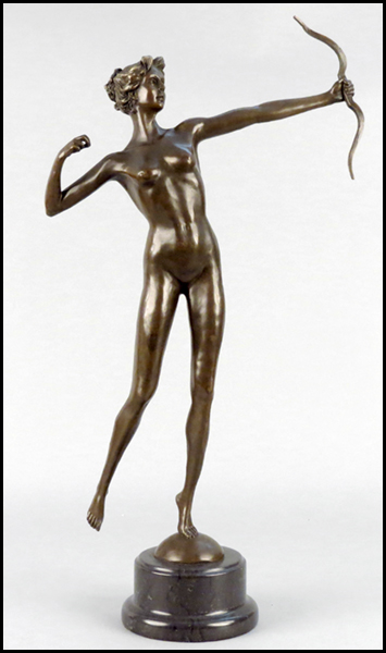 BRONZE NUDE FIGURE. Raised on a