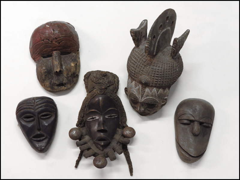 FIVE AFRICAN CARVED WOOD MASKS  178355