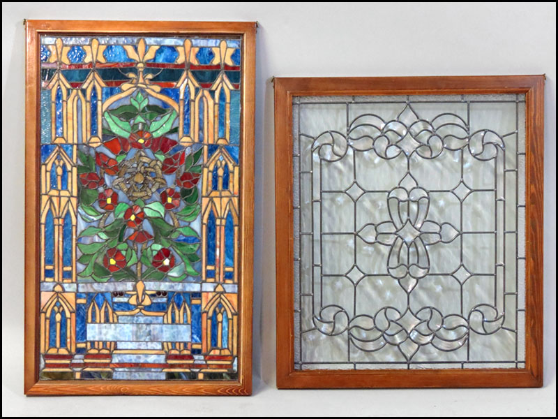 TWO WOOD FRAMED DECORATIVE GLASS HANGINGS.