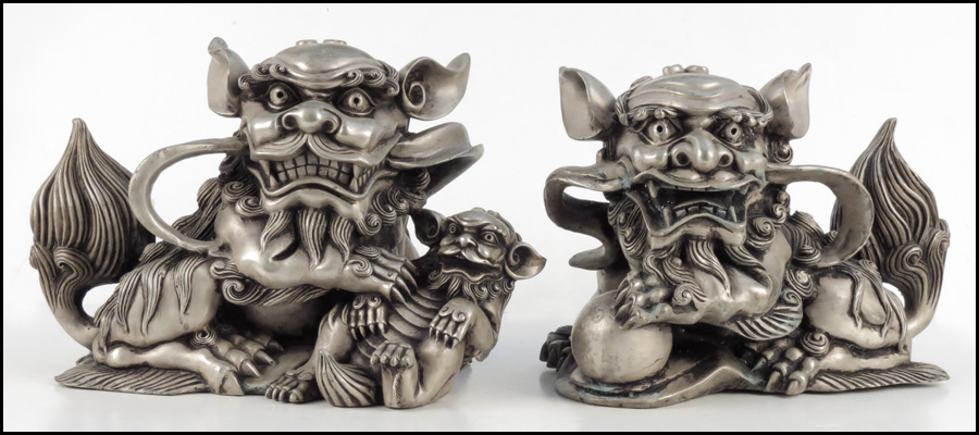 PAIR OF CHINESE METAL FOO DOGS.