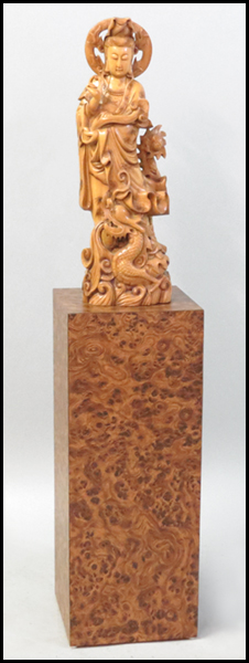 CARVED WOOD QUAN YIN. Raised on