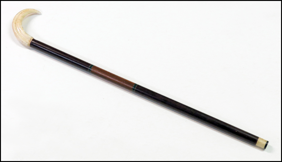 MAHOGANY WALKING STICK. Mixed wood