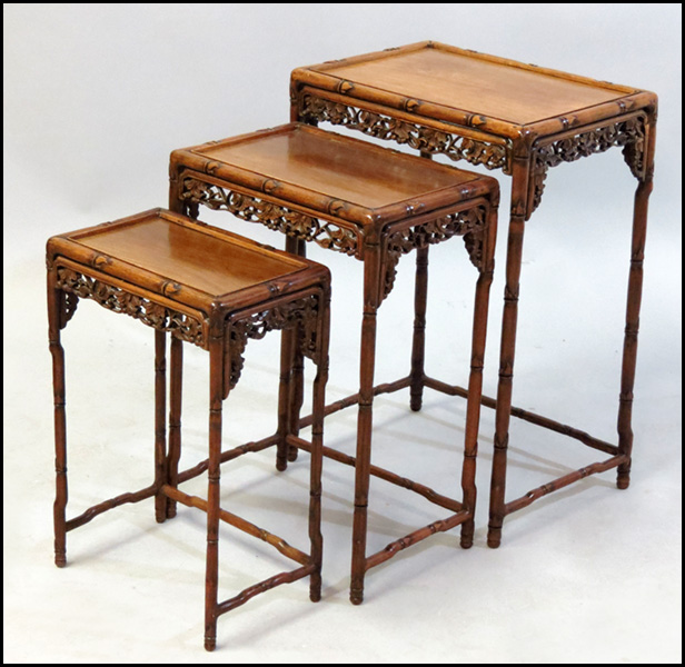 NEST OF THREE CARVED ELMWOOD TABLES  178610