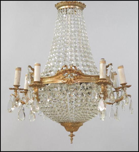 EIGHT-LIGHT BRONZE AND CRYSTAL CHANDELIER.