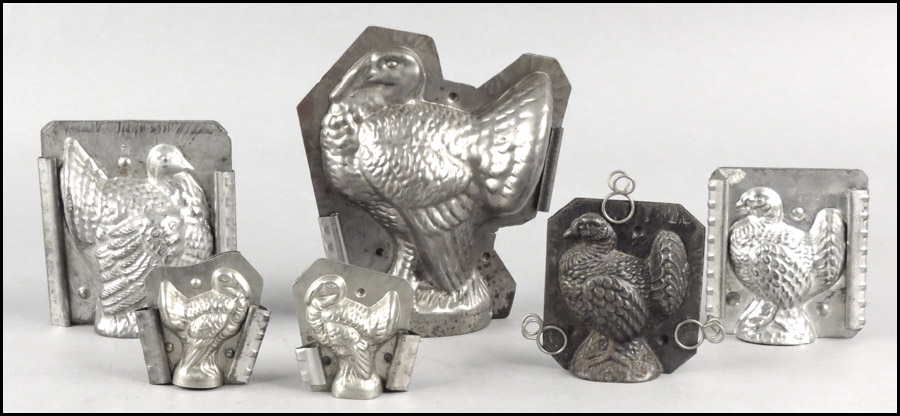 GROUP OF SIX TIN TURKEY MOLDS. Condition: