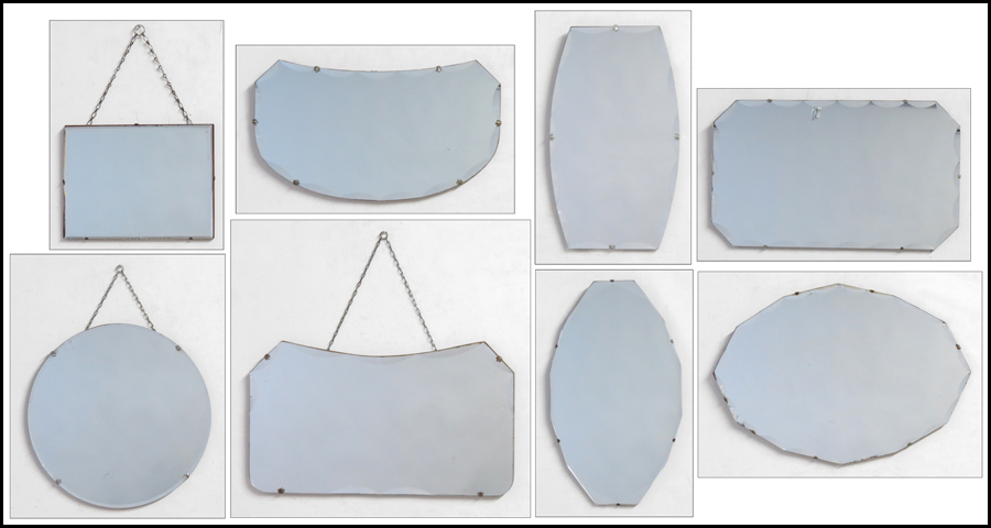 EIGHT BEVELED GLASS MIRRORS. Largest: