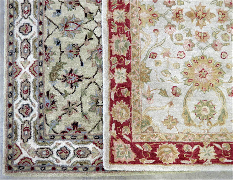 TWO CONTEMPORARY RUGS. Larger: