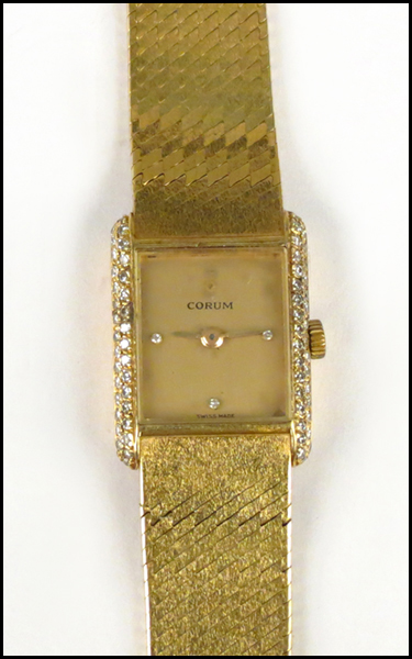 CORUM 18 KARAT YELLOW GOLD AND