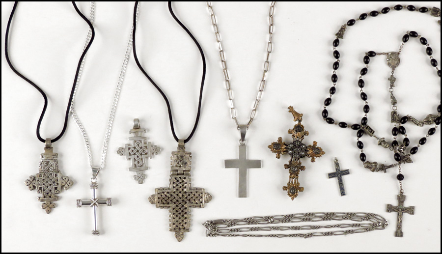 THREE STERLING SILVER CROSSES. Together