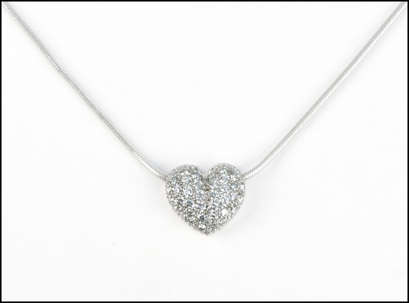 DIAMOND AND 14 KARAT WHITE GOLD HEART