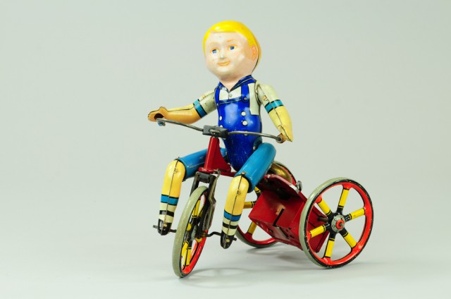 UNIQUE ART KIDDY CYCLIST C. 1950's