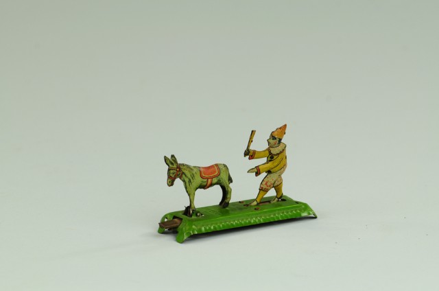 CLOWN CHASING DONKEY PENNY TOY 178bdc