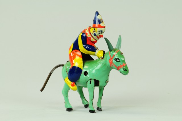 CLOWN ON DONKEY TOY Attributed 178cc6