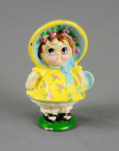 DOLLY DIMPLE PAPERWEIGHT Hubley colorfully