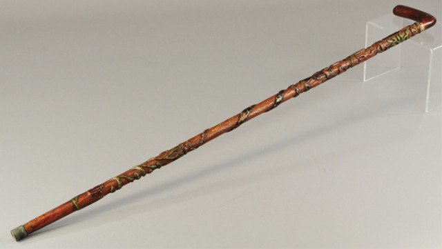 a/ WOOD CARVED CANE Extensive carving