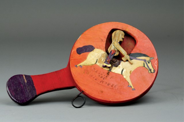 FOLK ART HAND PADDLE TOY Interesting