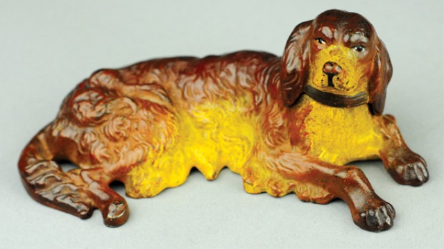 LYING DOG PAPERWEIGHT Cast iron