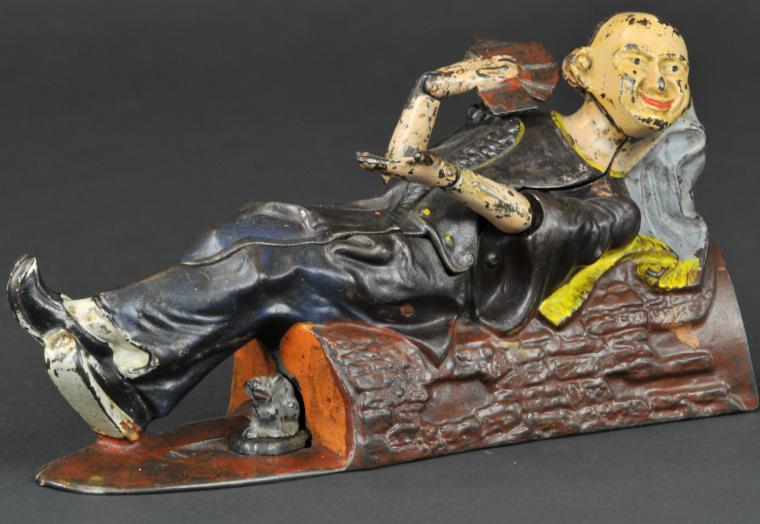 RECLINING CHINAMAN MECHANICAL BANK 17a760