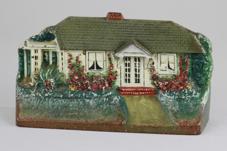 COTTAGE W/CURTAINS DOORSTOP Marked