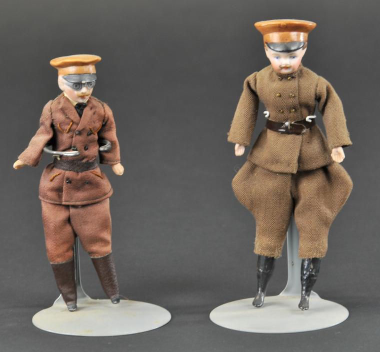 LOT OF TWO BISQUE CHAUFFEUR FIGURES