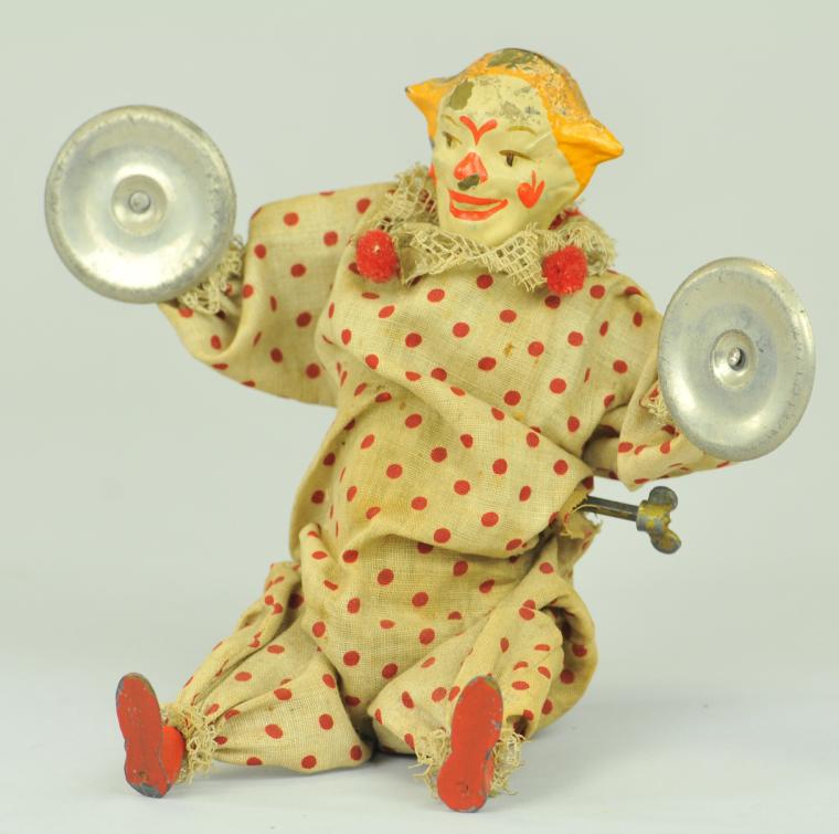 CLOWN WITH CYMBALS Hand painted tin