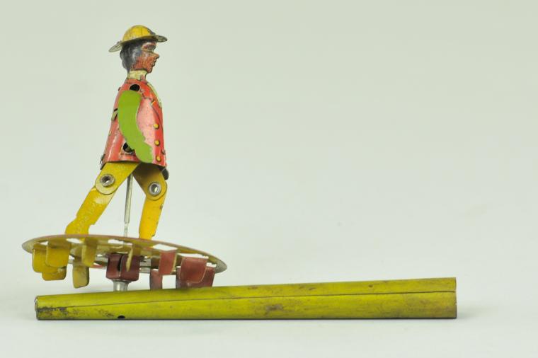 DANCING MAN PENNY TOY WHISTLE Attributed