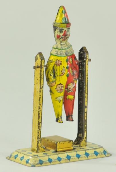 CLOWN ACROBAT PENNY TOY Very colorful 17aa60