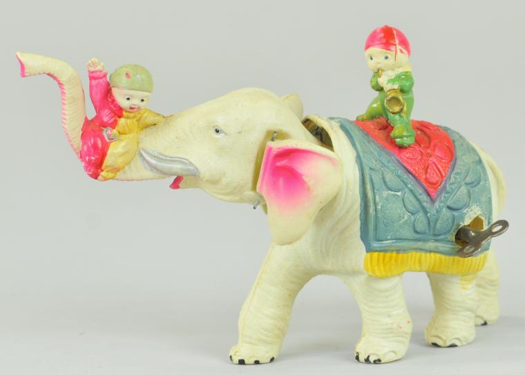 ELEPHANT AND TWO CHILD CLOWN RIDERS