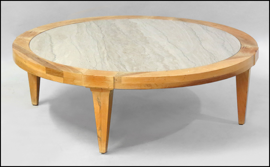 ROUND BLONDE WOOD COCKTAIL TABLE. With