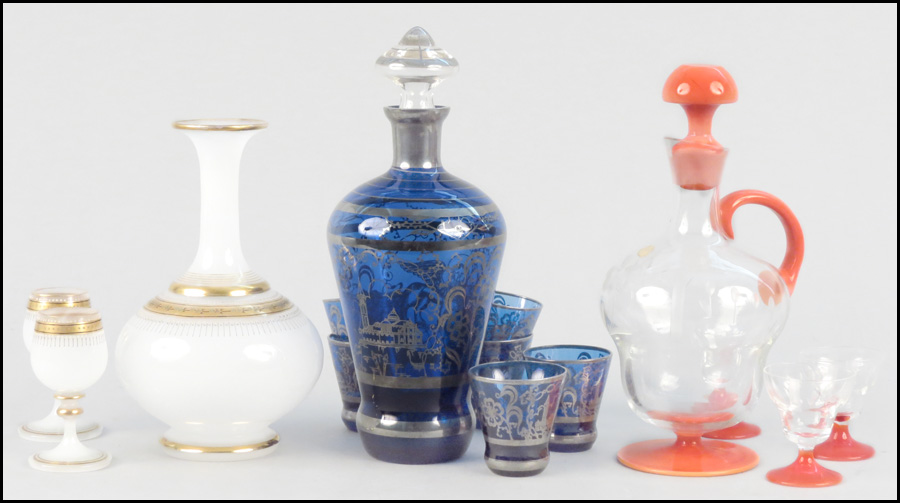 COBALT GLASS DECANTER AND SIX CORDIALS.