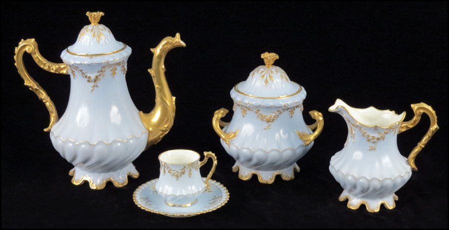 LIMOGES GILT PORCELAIN COFFEE SERVICE.