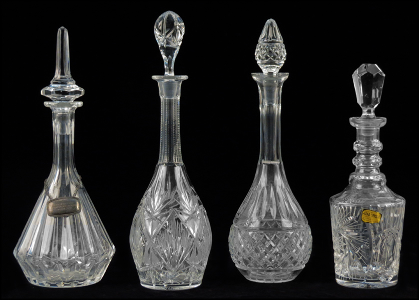 GROUP OF FOUR CRYSTAL DECANTERS.