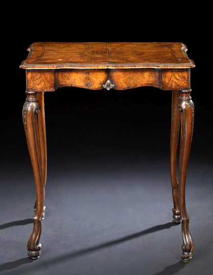 Italian Carved Walnut Table,  the banded