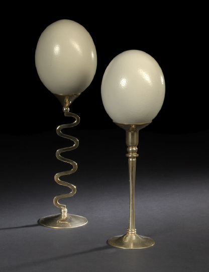 Two Brass-Mounted Ostrich Egg Garnitures,