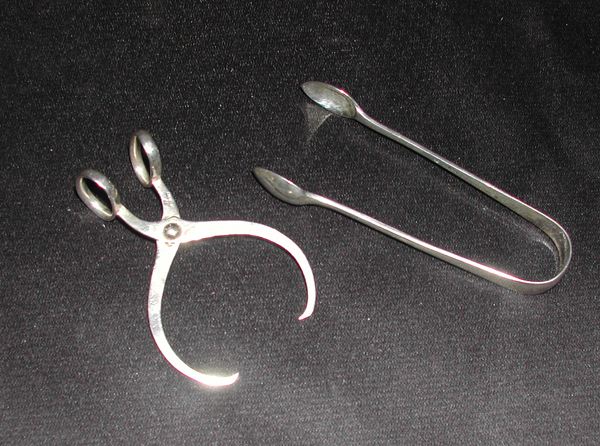 Two Pairs of Sterling Silver Sugar Tongs,