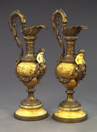 Pair of Large Exuberantly Modeled Gilded