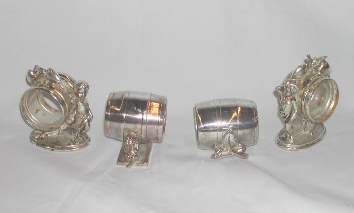 Group of Four Napkin Rings,  consisting