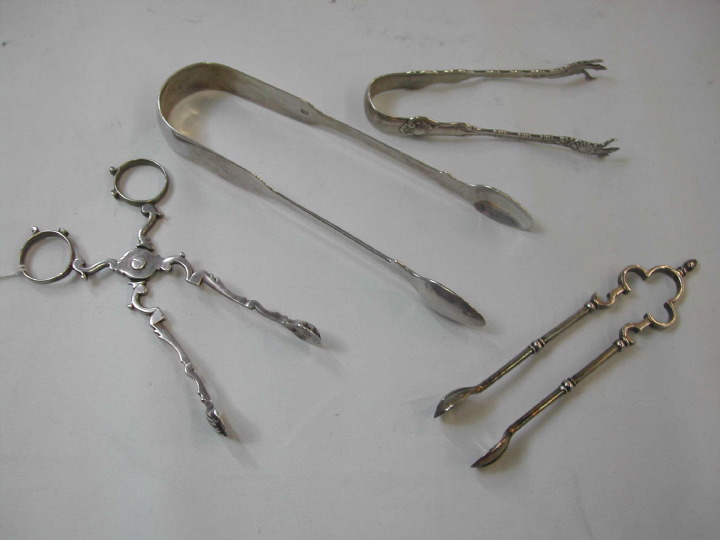 Group of Four Silver Sugar Tongs  2dbda