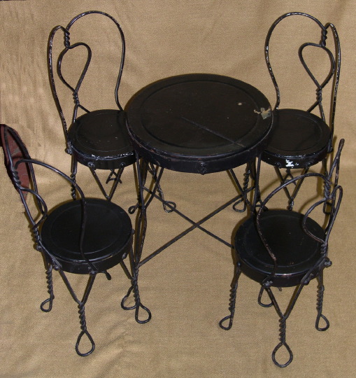 Five-Piece French Wrought-Iron Dolls
