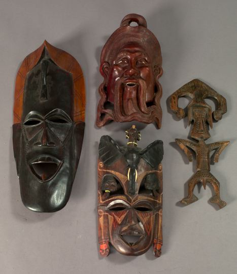 Collection of Four Carved Masks  2f0bc